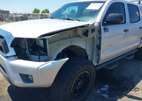 2012 Toyota Tacoma Base V6 z USA, uszkodzony, nr VIN 3TMLU4EN1CM087213